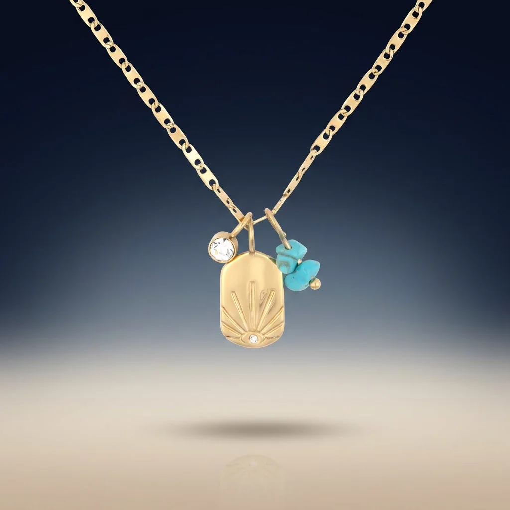 Gold pendant necklace with a crystal and turquoise charms