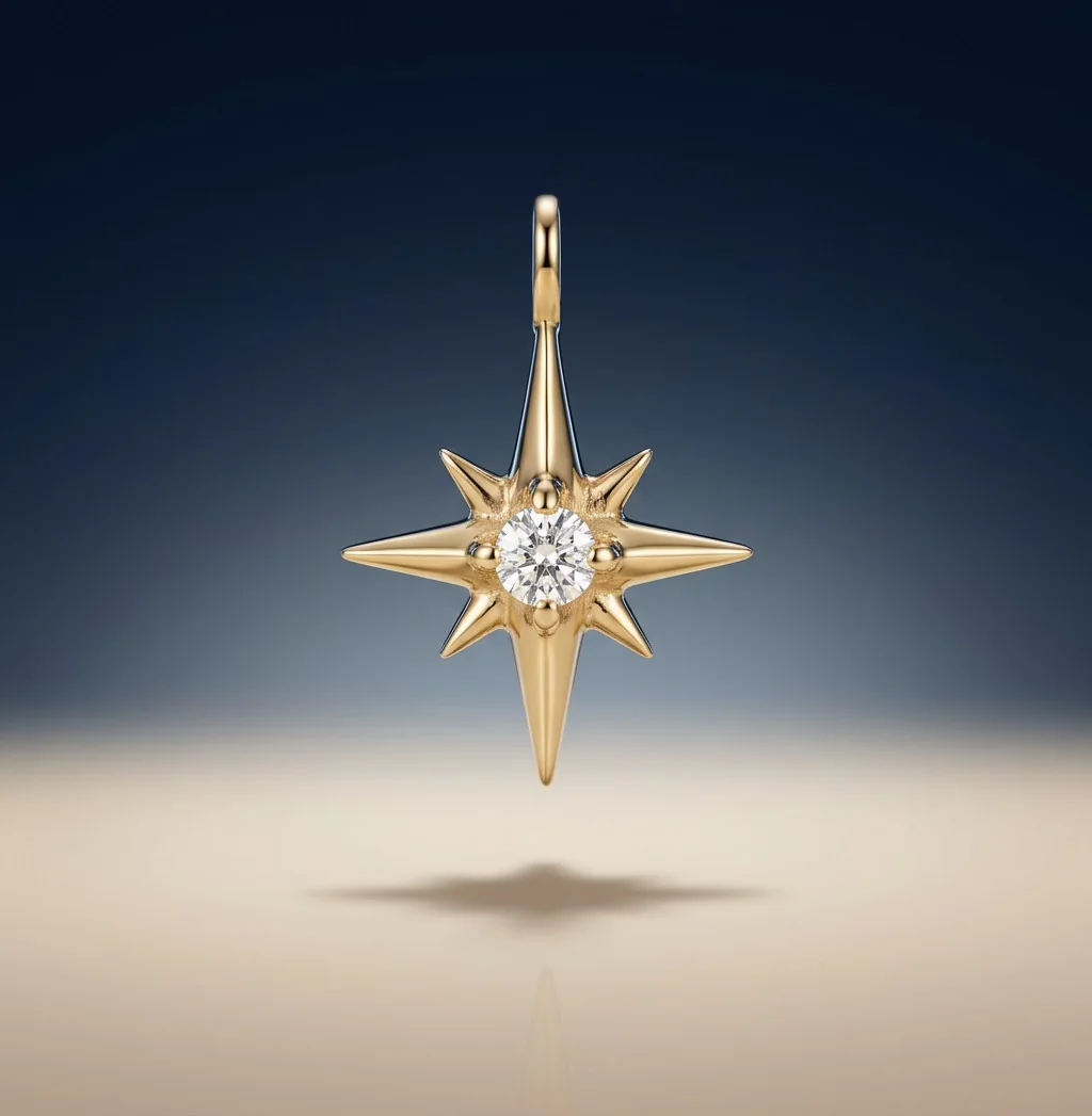 A gold star pendant set with a clear stone